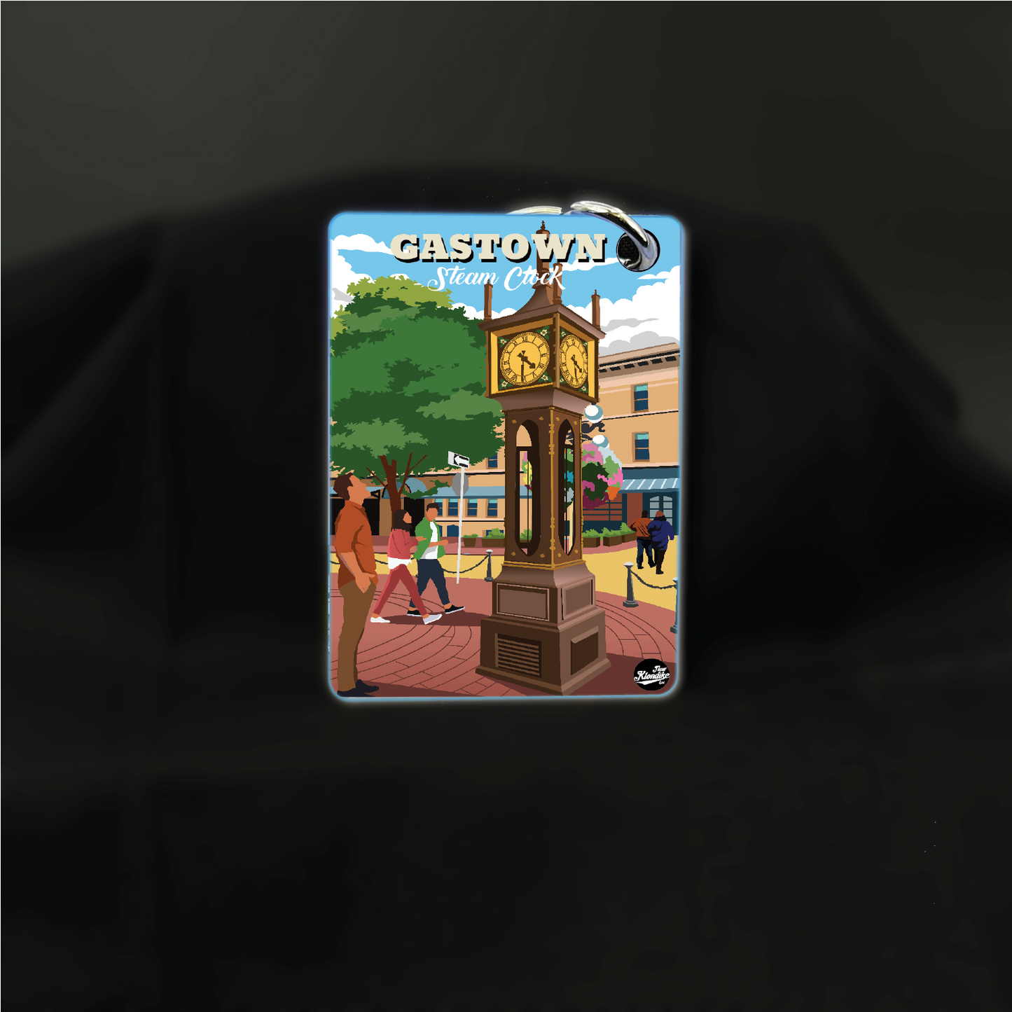 Art key chain featuring Gastown Vancouver scene from New Klondike Arts and Media, showcasing a daytime view of Gastown's historic district.