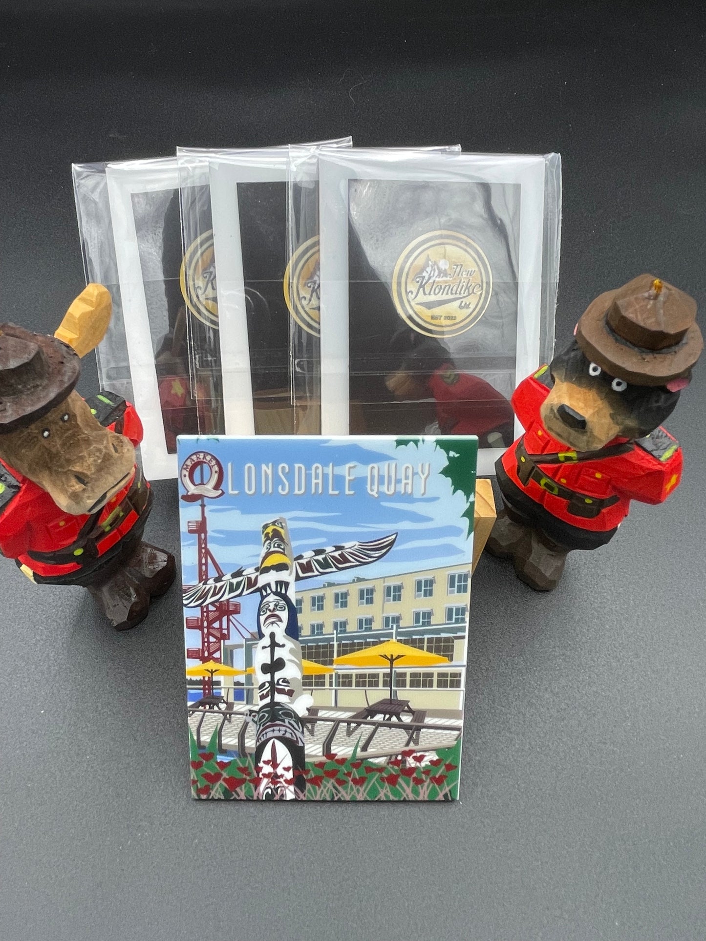 Lonsdale Quay totem fridge magnet from Vancouver, Canada by New Klondike Arts and Media, featuring colorful totem pole design.