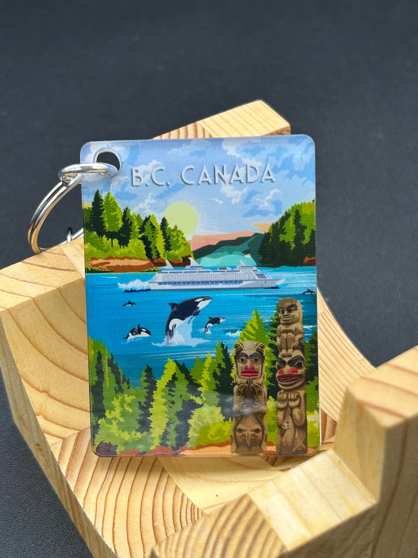 British Columbia art key chain by New Klondike Arts and Media, featuring colorful regional design and compact key holder.