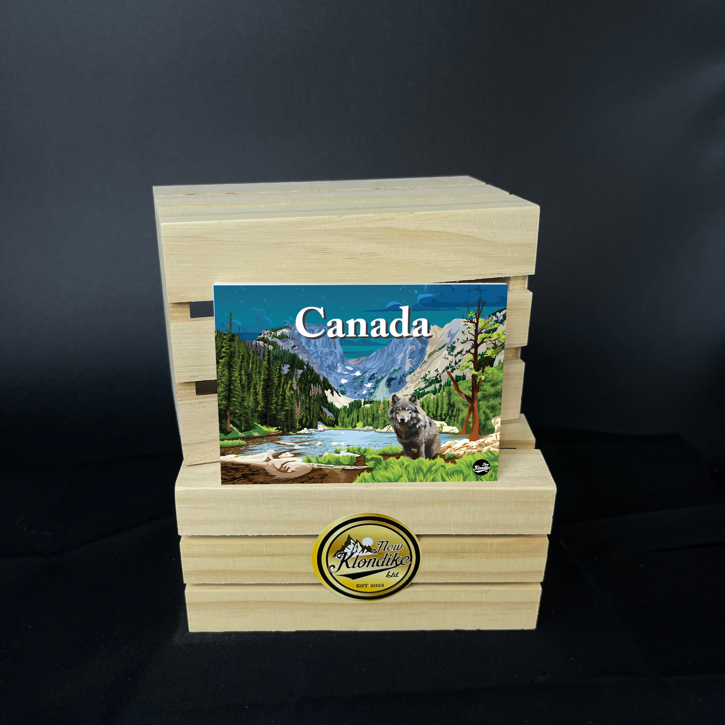 Large Wolf fridge magnet featuring Canadian Rockies scenery, by New Klondike Arts and Media, measuring 2.5x3.5 inches.