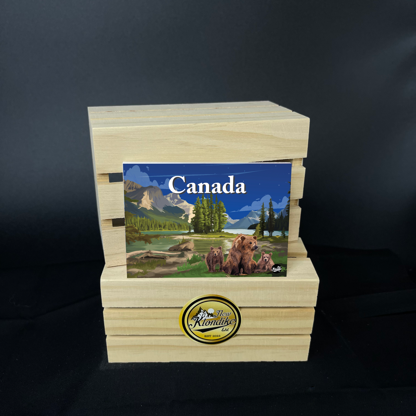 Large Canadian Rockies bears fridge magnet, 2.5x3.5 inches, by New Klondike Arts and Media, featuring mountain and bear imagery.