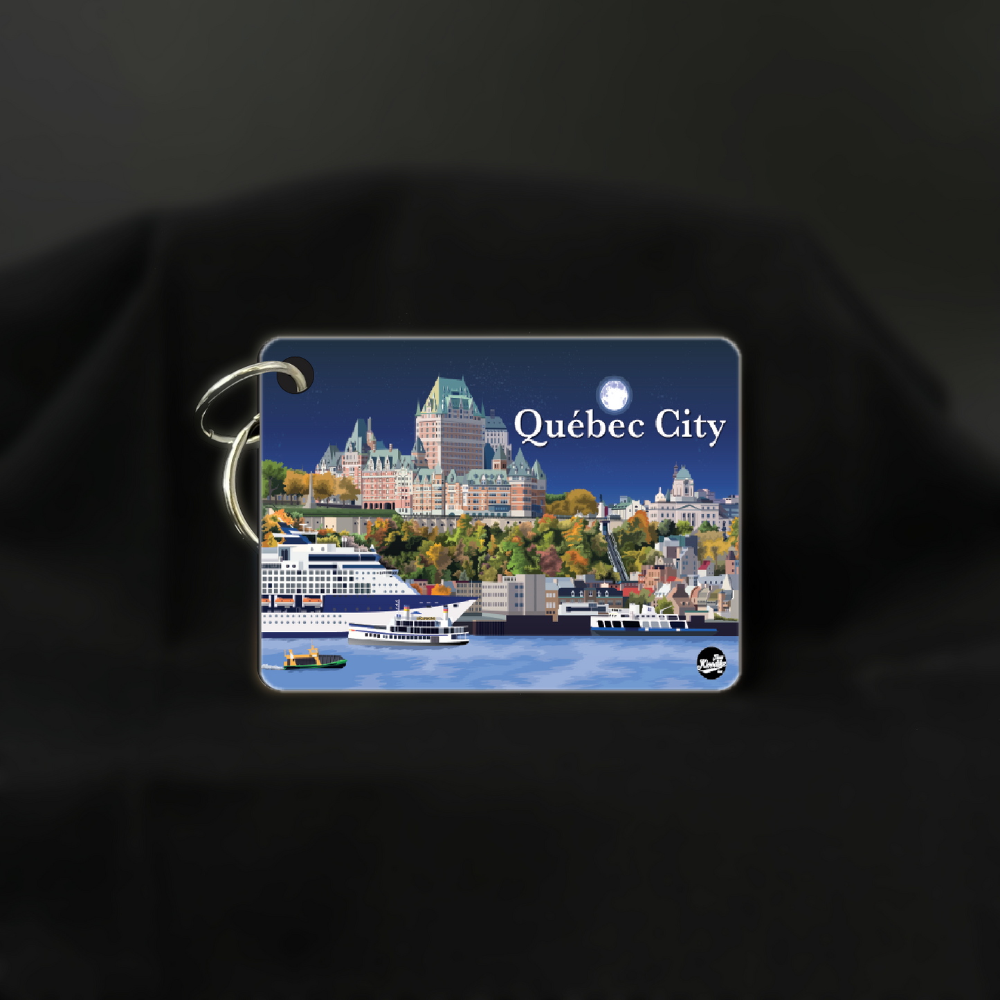 Art key chain featuring a nighttime view of Quebec City, Canada, by New Klondike Arts and Media.