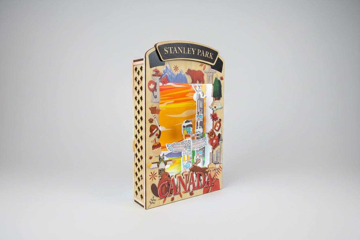 Light up shadow box featuring Stanley Park scene by New Klondike Arts and Media, showcasing illuminated woodland artwork.